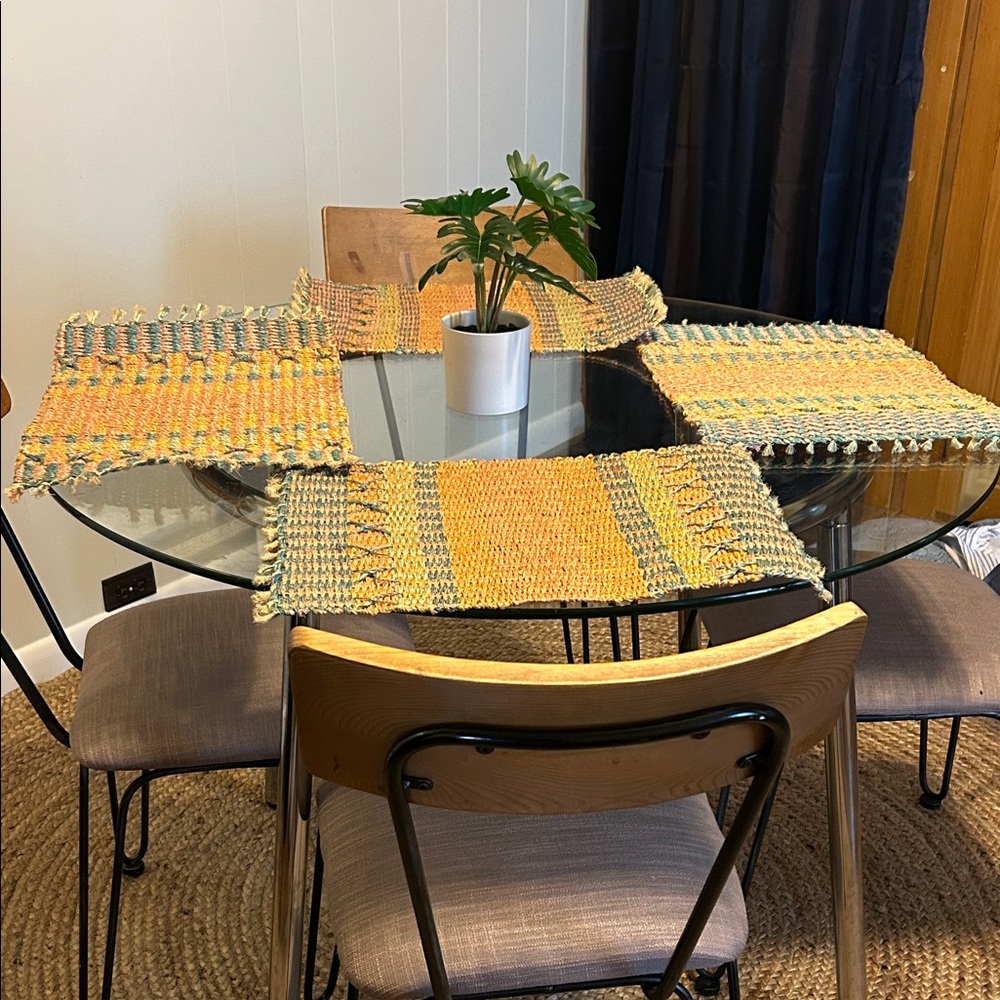 4 like new pink and blue jute placemats.